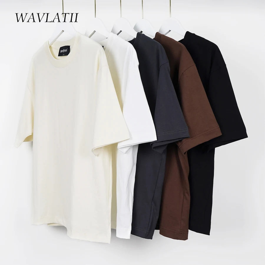 Four shirts in beige, white, black, and brown hanging on a rack with 'WAVLATII' branding.